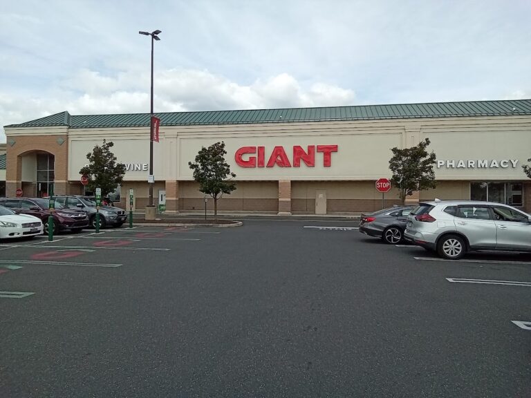 Giant storefront sign installation by MRC Signs