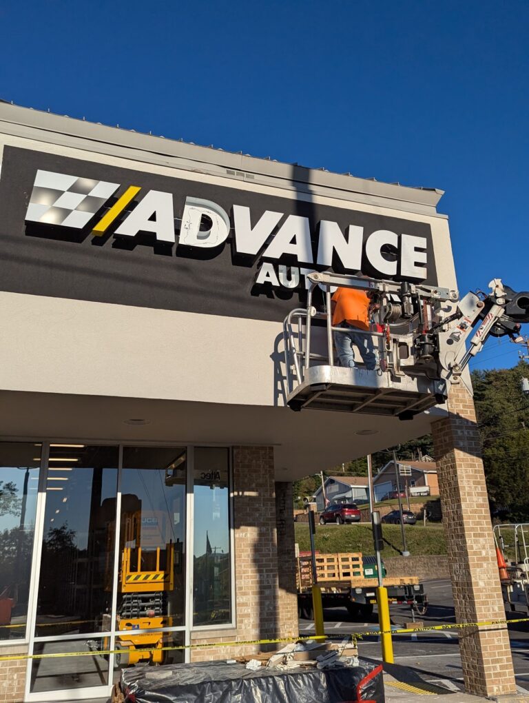 Advance Auto Parts channel letters installed from a bucket truck