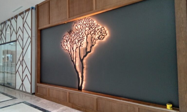 Backlit tree logo feature wall
