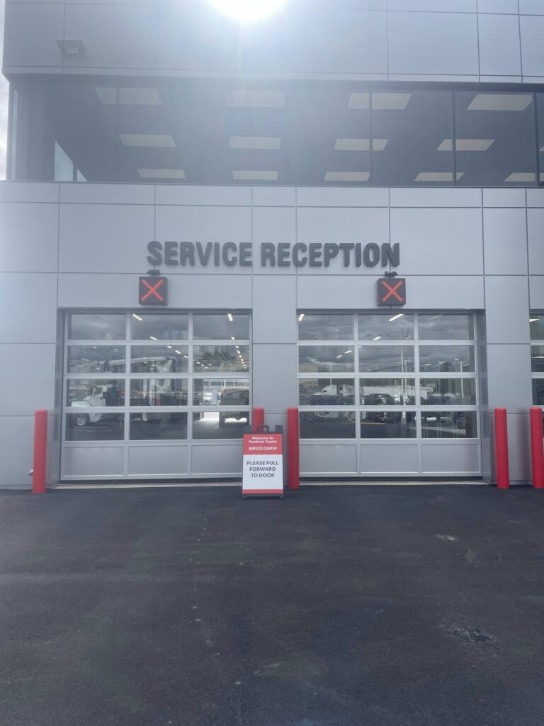 Dealership service reception sign