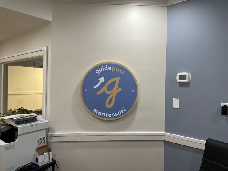 Guidepost Montessori lobby logo sign