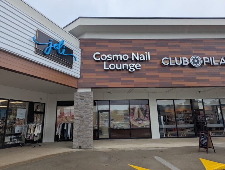 Shopping center tenant signs for Joli, Cosmo Nail Lounge and Club Pilates